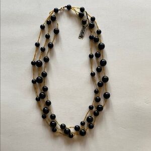 Vintage genuine Lucite, three strand necklace.